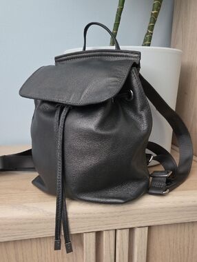 Danier Gunmetal Gray Leather Drawstring Bucket Backpack with Silver Hardware